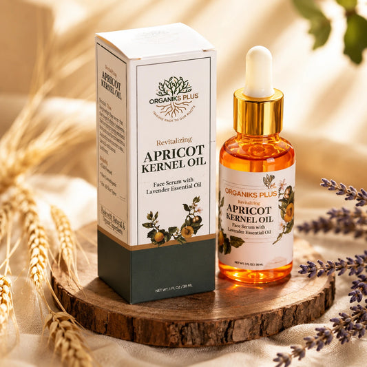 Organiks Plus Apricot Kernel Oil bottle and packaging on a wooden surface with lavender flowers.