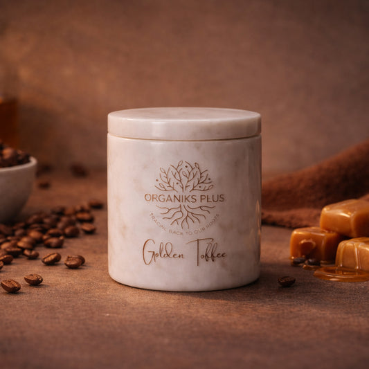 Jar labeled 'Organiks Plus Golden Toffee' with coffee beans and caramels on a brown background
