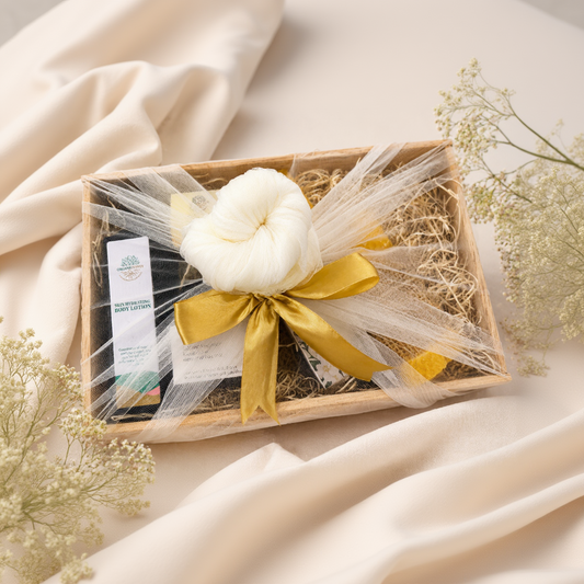 Organiks Plus Natural Wellness Gift basket with a white flower and yellow ribbon on a neutral background