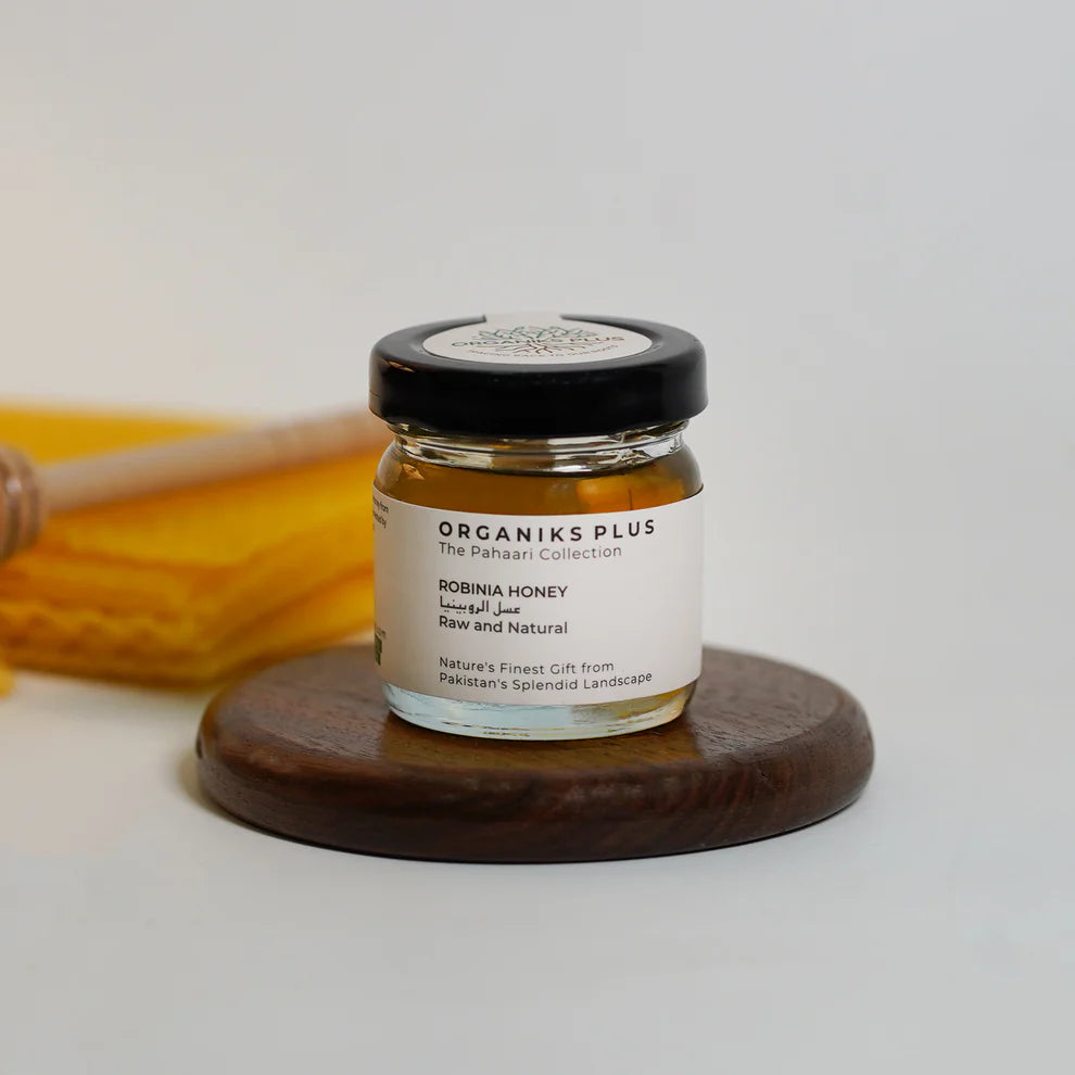 Organiks Plus Robinia Honey 40gm – raw floral honey harvested from Robinia flowers in Chitral Pakistan.